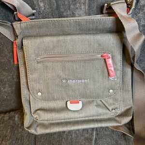 Sherpani Olive Crossbody Bag with Coral Red Accents